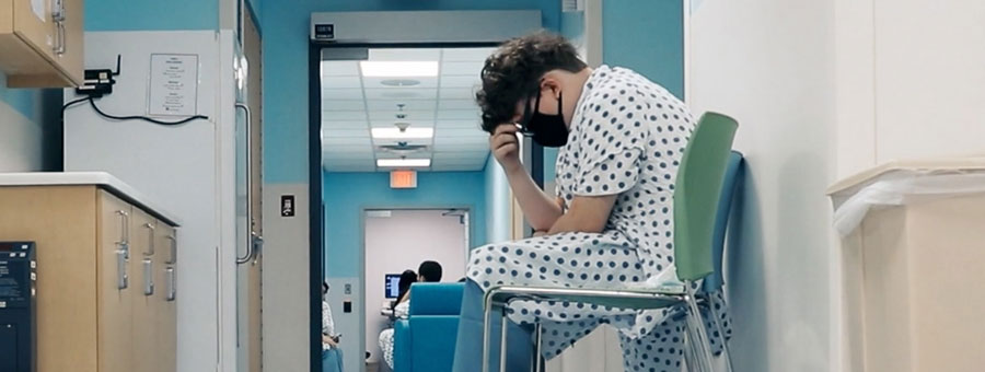 Patient sitting in waiting area.