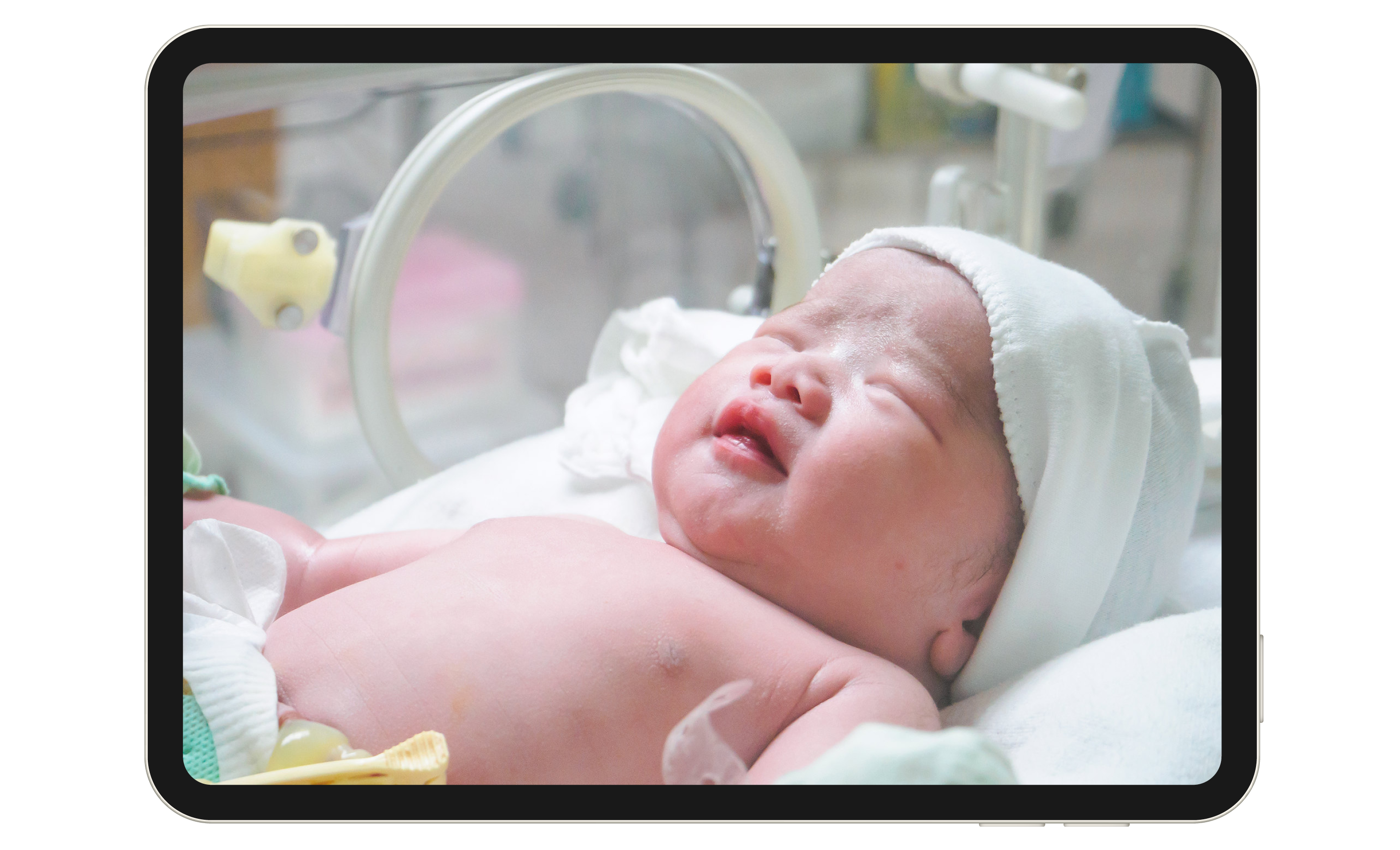 Woman holding newborn child.