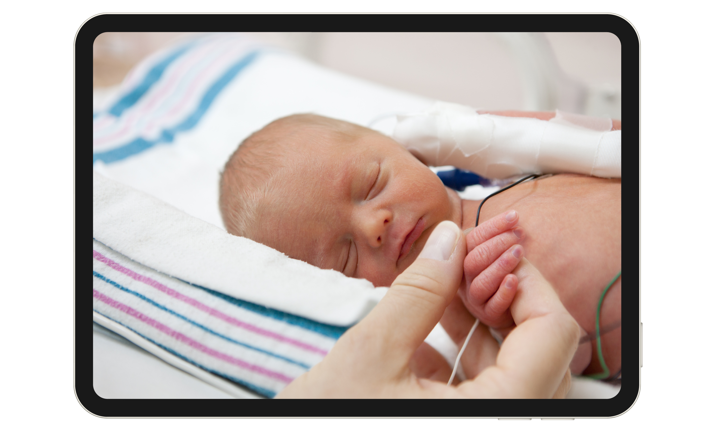 Adult hand holding a newborn infant. 